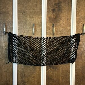 Vehicle trunk envelope style cargo net